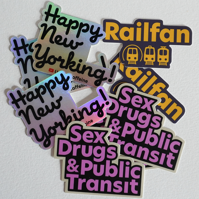 A pile of vinyl stickers of different varieties.