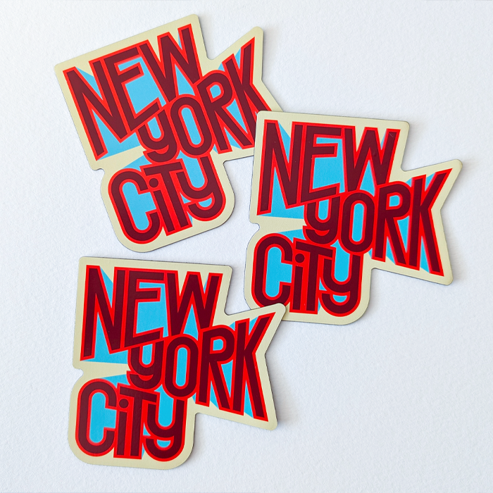 Pile of New York souvenir magnet