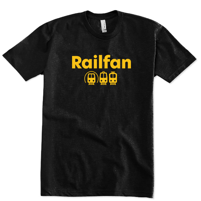 Black t-shirt with graphic design on the front. The design is in yellow print with the word "Railfan"  with train icons beneath it.